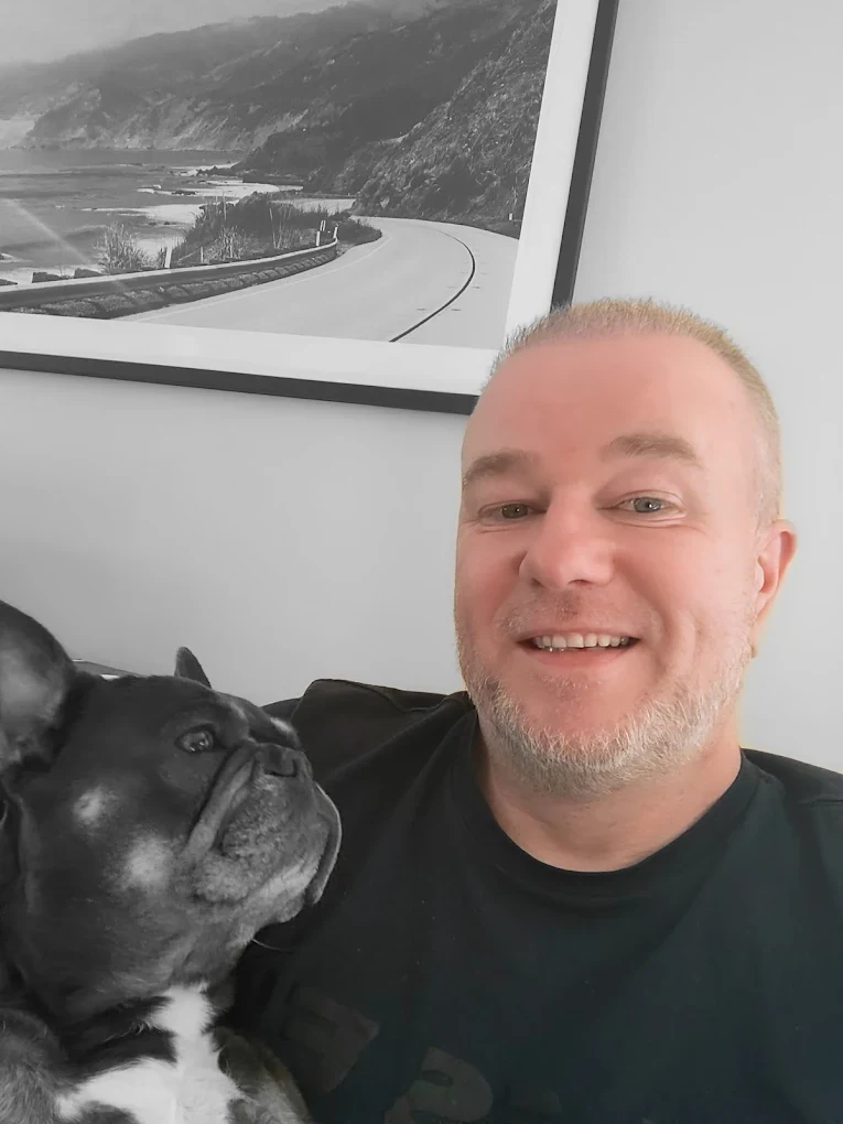 Michael Hawkins, independent financial adviser, with French bulldog Kiki.